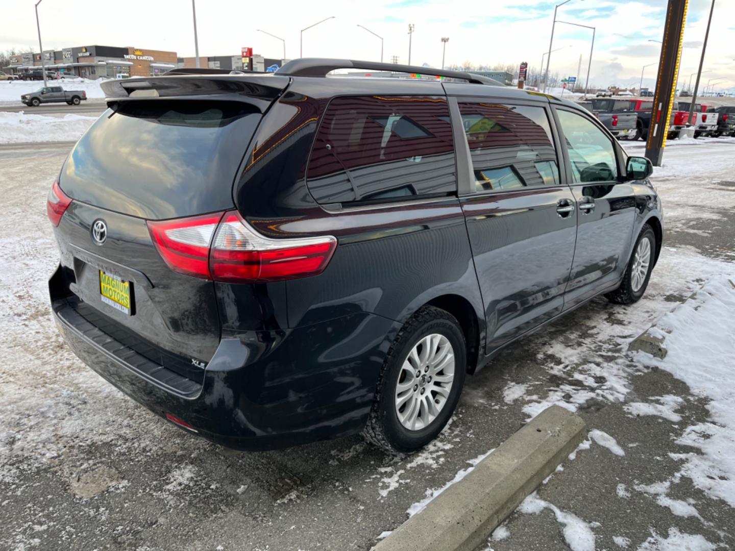 2016 BLACK /Gray Toyota Sienna XLE FWD 8-Passenger V6 (5TDYK3DC5GS) with an 3.5L V6 EFI DOHC 24V engine, 5A transmission, located at 1960 Industrial Drive, Wasilla, 99654, (907) 274-2277, 61.573475, -149.400146 - Photo#4